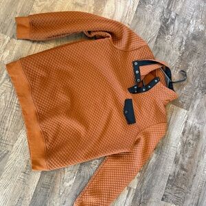 Quilted Orange Pullover with Black Accents